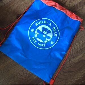 Build a Bear blue and orange drawstring bag